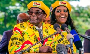 Zimbabwe - Mugabe faces - Copy